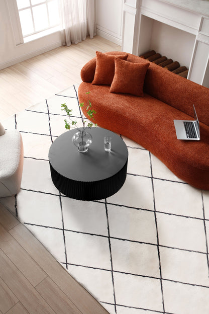 Sleek and Modern Round Coffee Table by Blak Hom