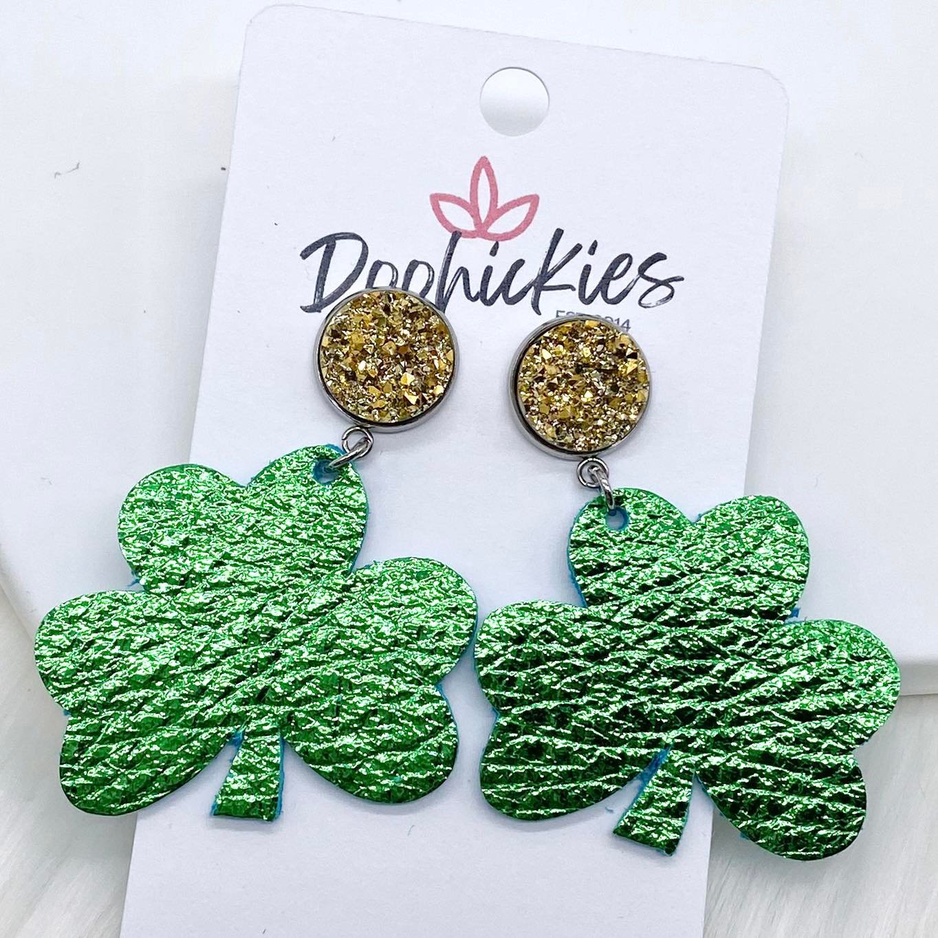 2" Gold & Metallic Green Shamrock Dangles (Leather) -Earrings by Doohickies Wholesale