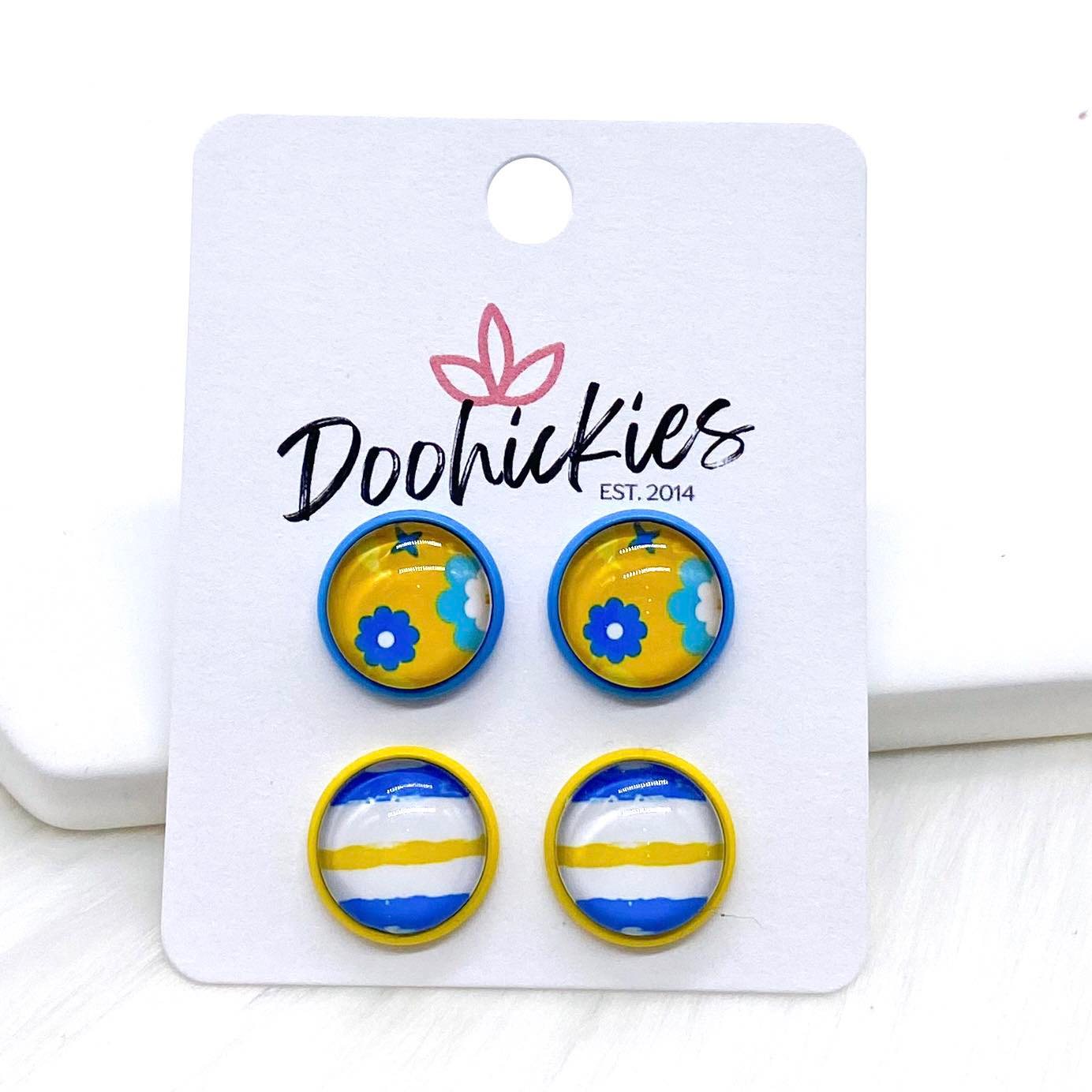 12mm Blue/Yellow Flowers & Lines in Light Blue/Yellow Settings -Earrings by Doohickies Wholesale