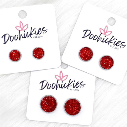 Red Sparkle Singles in Stainless Steel Settings -Earrings by Doohickies Wholesale