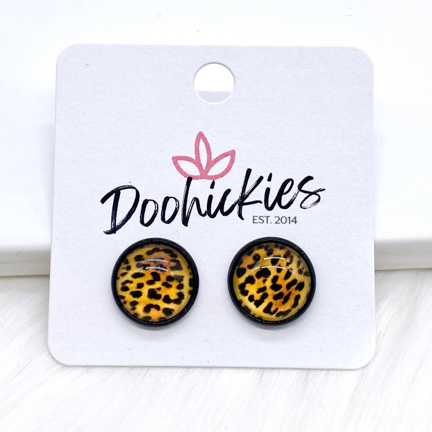 12mm Jungle Cat Singles in Black Settings -Earrings by Doohickies Wholesale