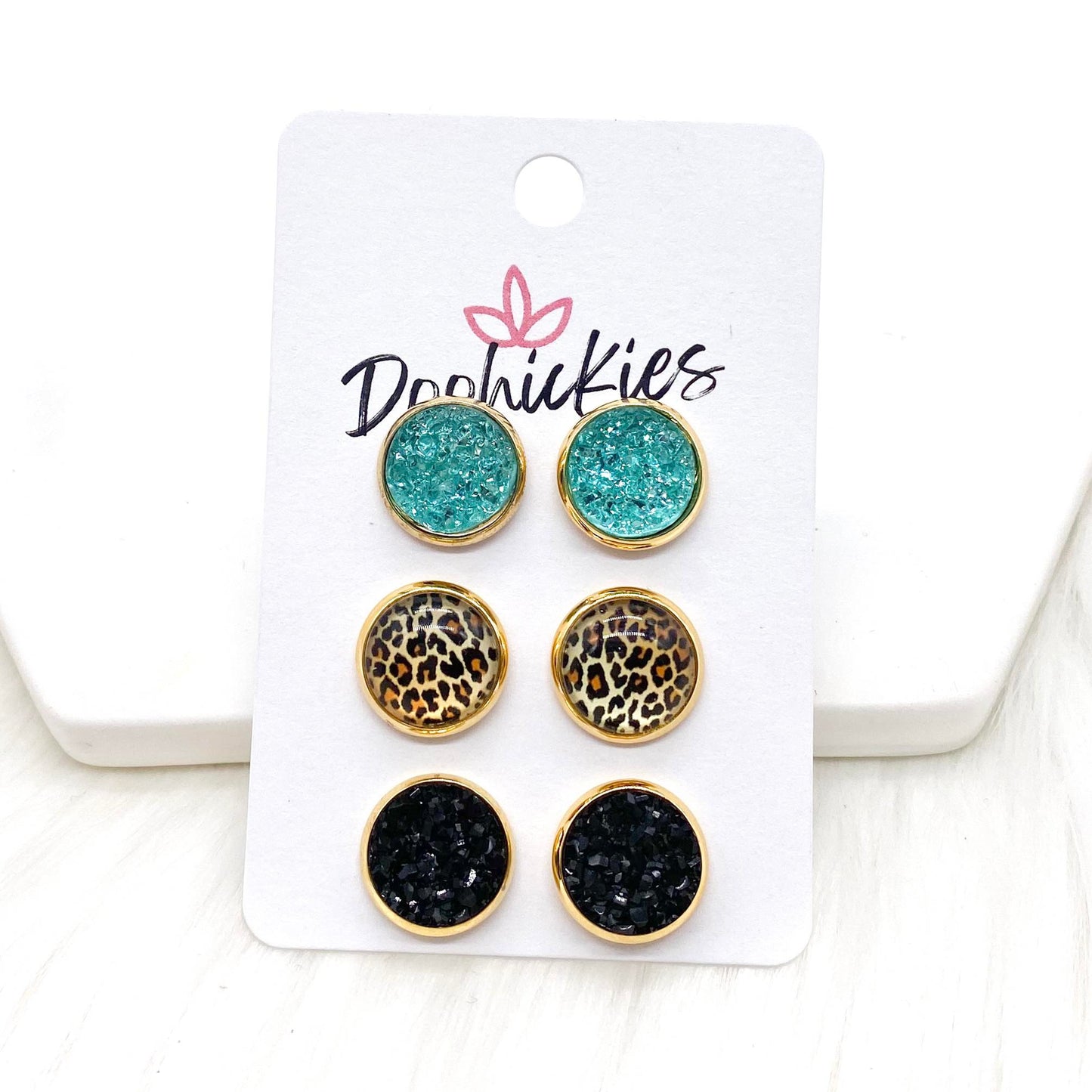 12mm Light Teal Sparkles/Golden Leopard/Black in Gold Settings -Earrings by Doohickies Wholesale