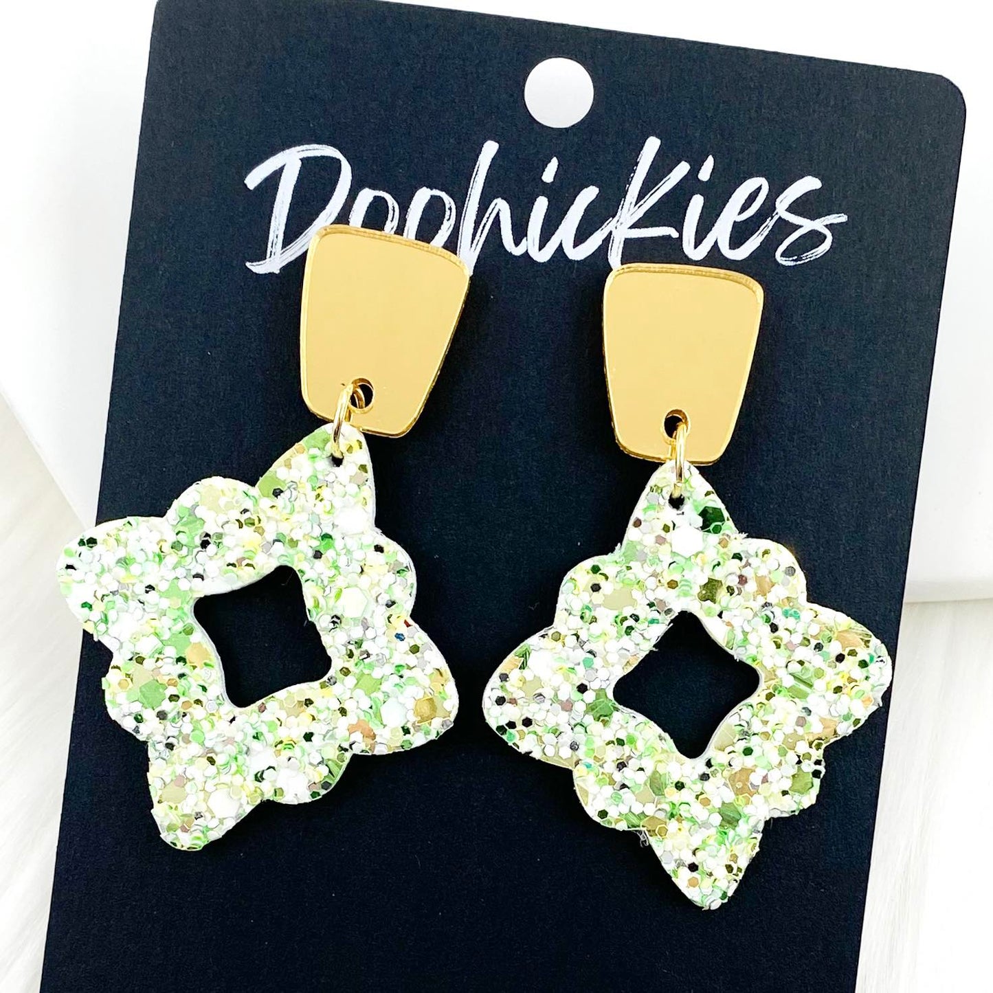 2.25" Gold Long Trap. & Shamrock Glitter Lacies -St. Paddy Earrings by Doohickies Wholesale