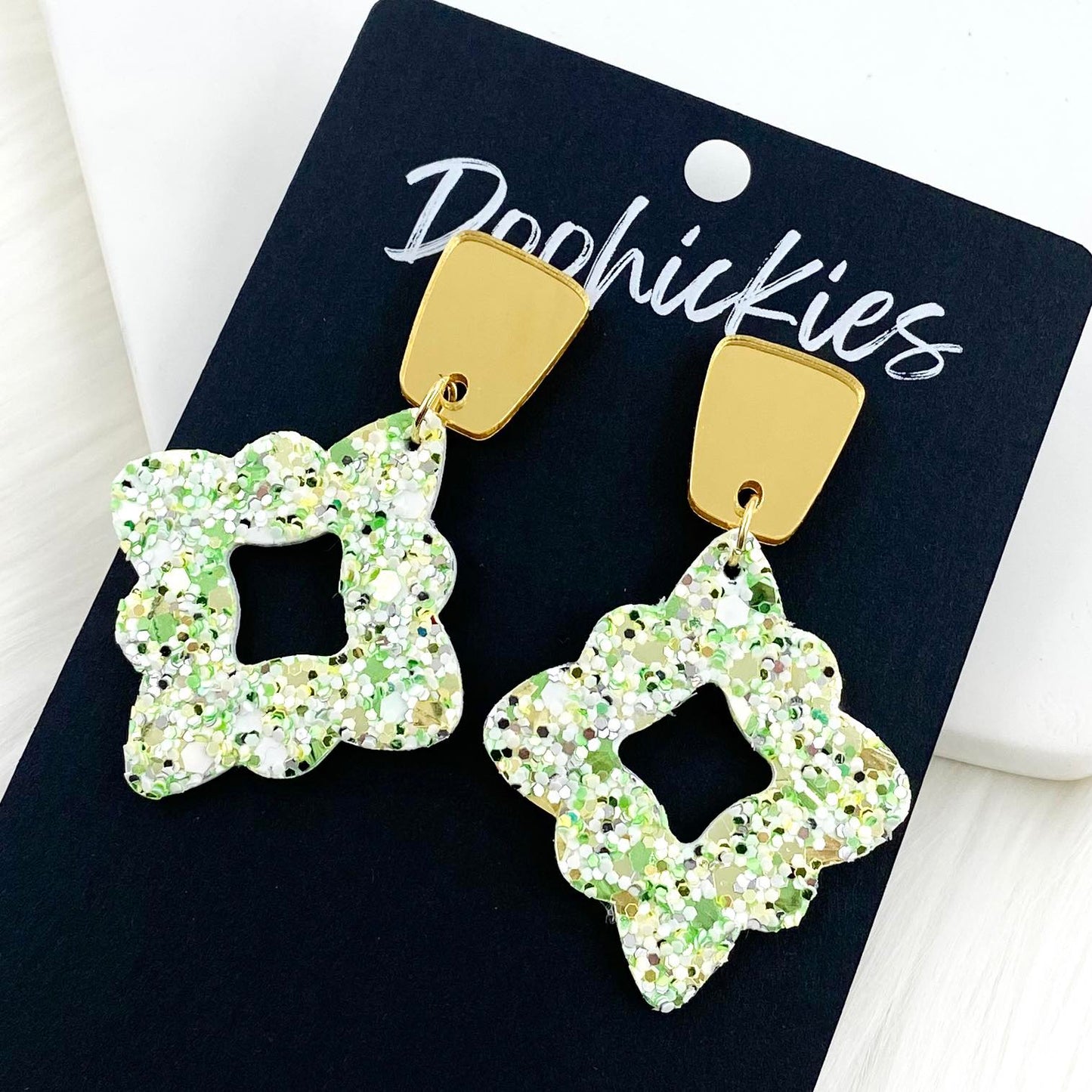 2.25" Gold Long Trap. & Shamrock Glitter Lacies -St. Paddy Earrings by Doohickies Wholesale