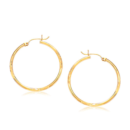 14k Yellow Gold Fancy Diamond Cut Slender Large Hoop Earrings (30mm Diameter) by Avera Group