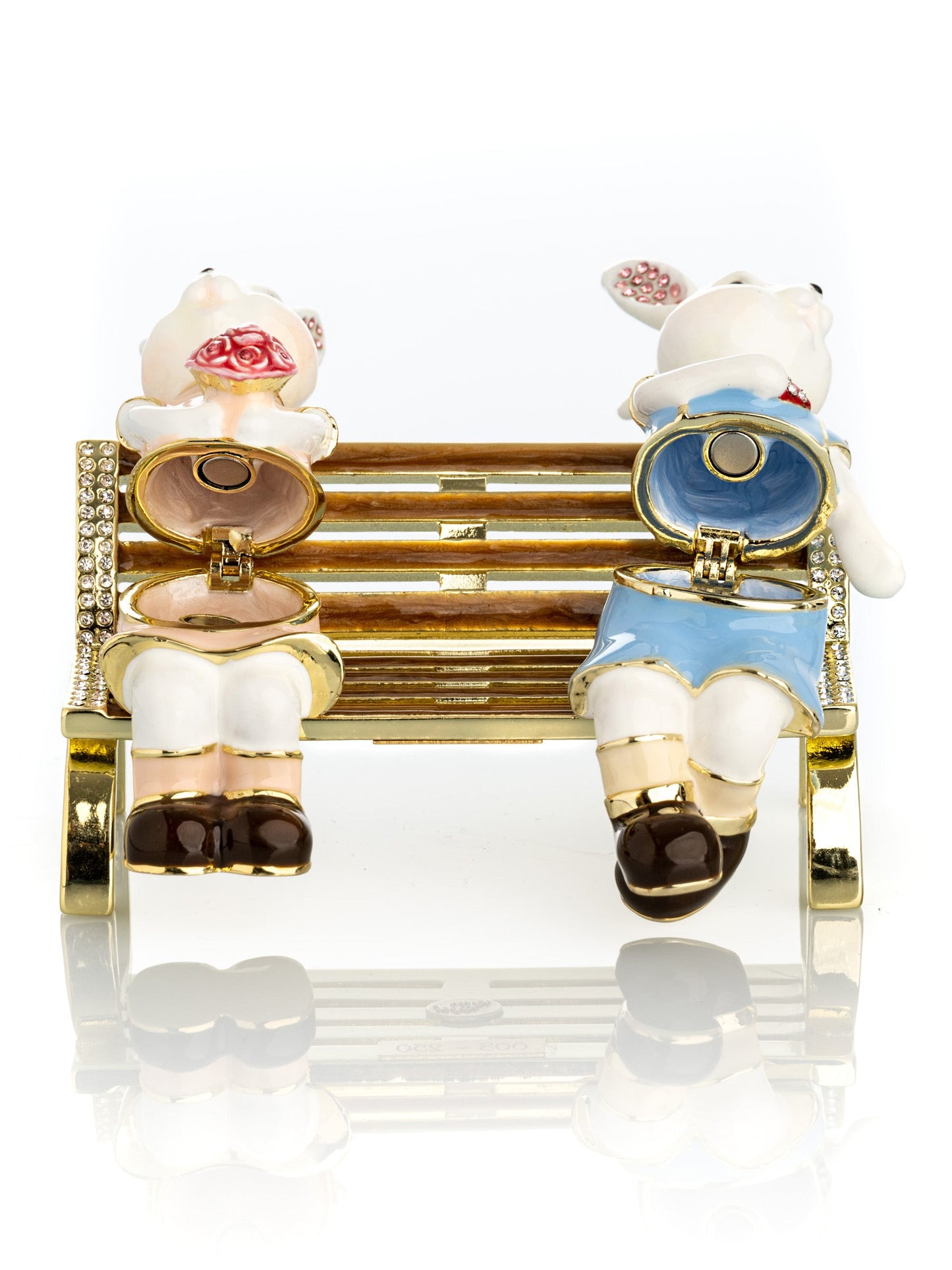 2 bunnies in love sitting on a bench, valentine flowers and chocolates by Keren Kopal