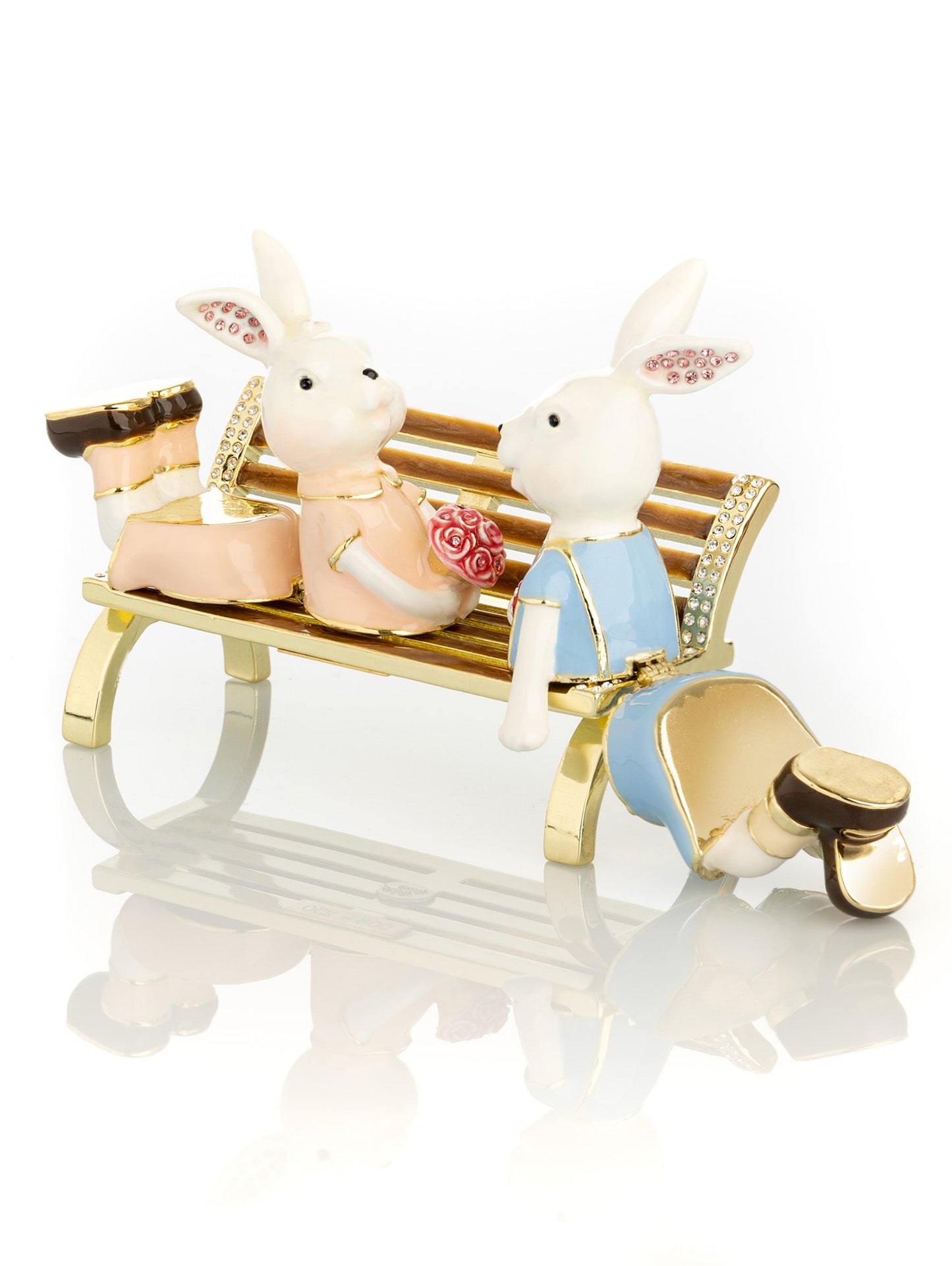 2 bunnies in love sitting on a bench, valentine flowers and chocolates by Keren Kopal