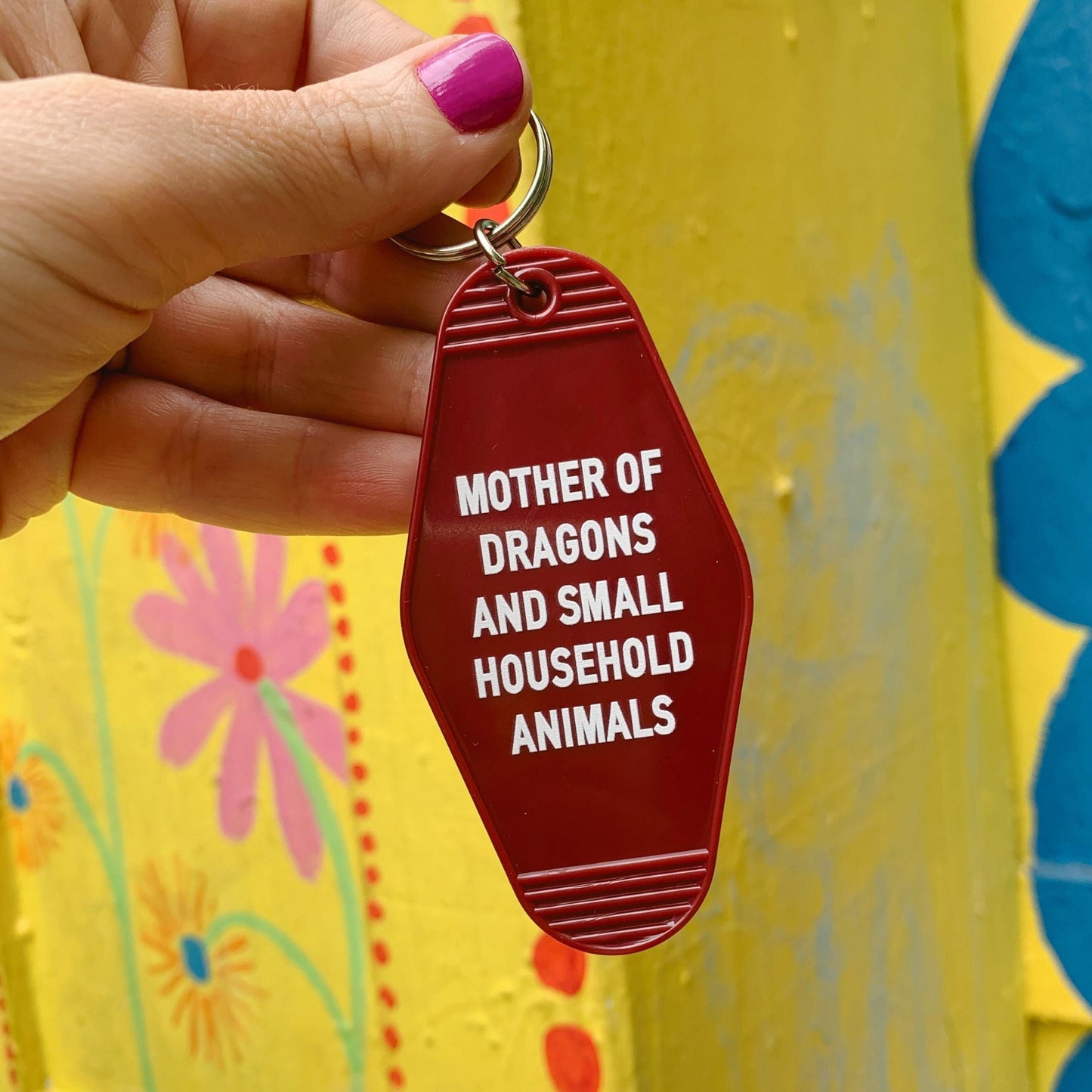 Mother of Dragons and Small Household Animals Motel Style Keychain in Dark Red by The Bullish Store