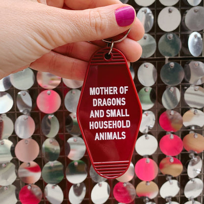 Mother of Dragons and Small Household Animals Motel Style Keychain in Dark Red by The Bullish Store