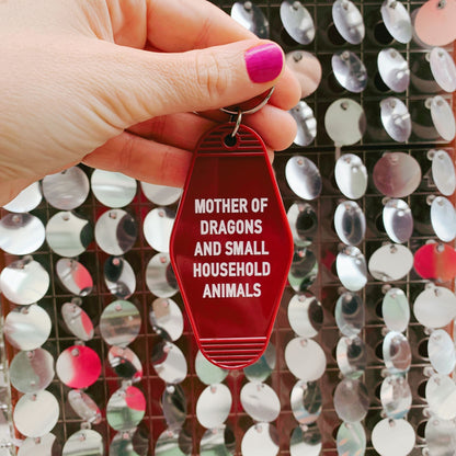 Mother of Dragons and Small Household Animals Motel Style Keychain in Dark Red by The Bullish Store