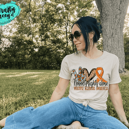 Multiple Sclerosis Awareness Nobody Fights Alone- Ribbon-Unisex T-shirts by Crafty Casey's