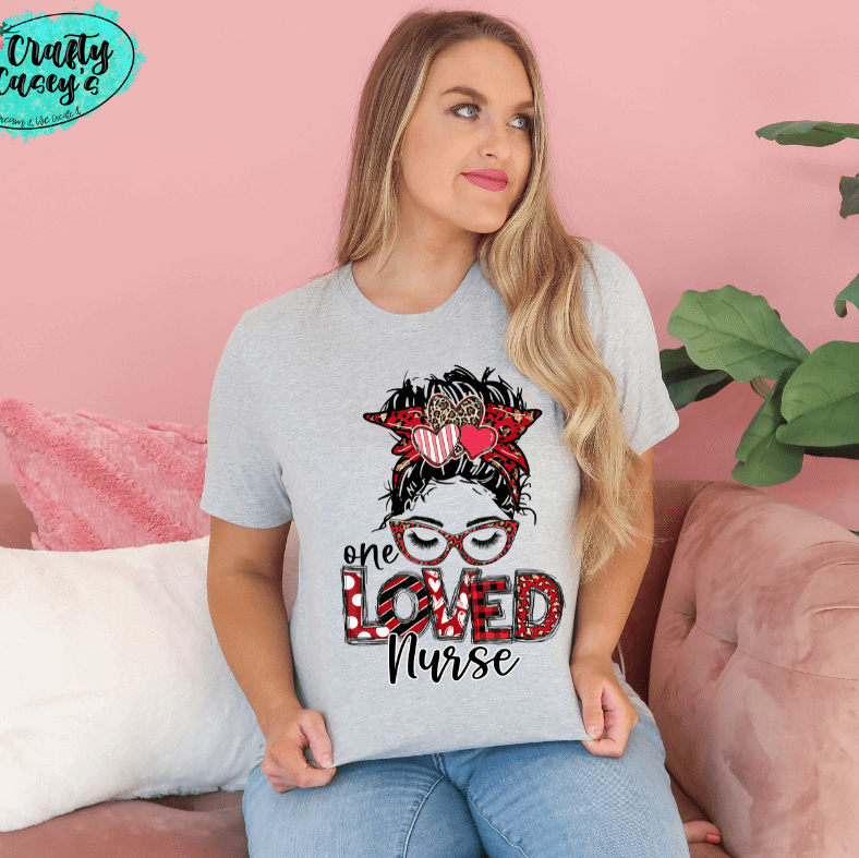 One Loved Nurse Messy Bunn Valentines - Women's  Unisex- t-shirt by Crafty Casey's