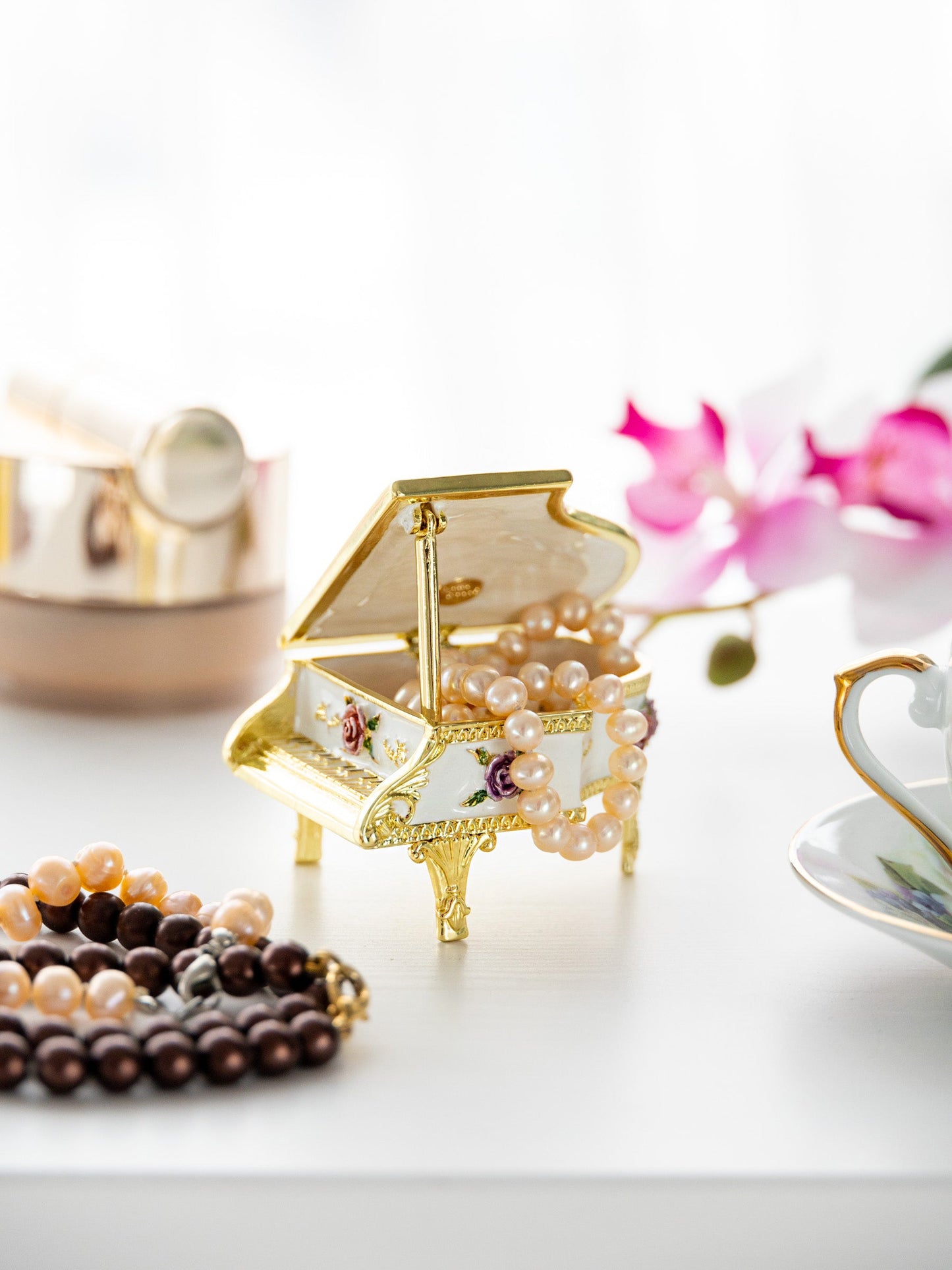 White piano with flowers by Keren Kopal