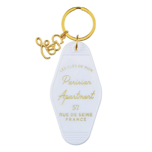 Parisian Apartment Motel Keychain in White by The Bullish Store