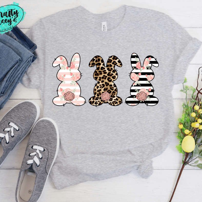 Pastel Bunny Trio-Easter -  T-shirt. by Crafty Casey's