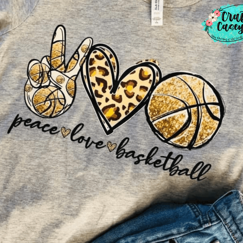 Peace Love Basketball Women's Unisex Tee by Crafty Casey's