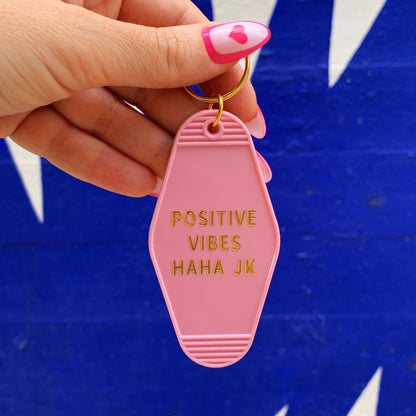 Positive Vibes Haha JK Motel Keychain in Pink by The Bullish Store