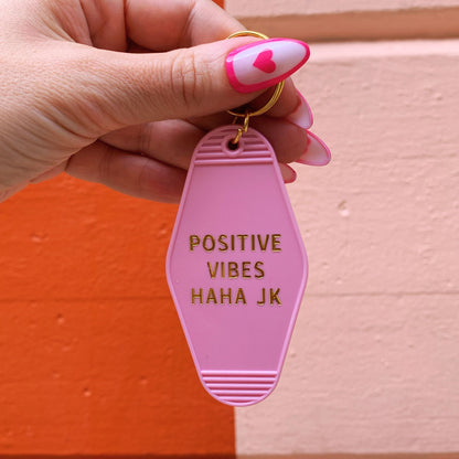 Positive Vibes Haha JK Motel Keychain in Pink by The Bullish Store