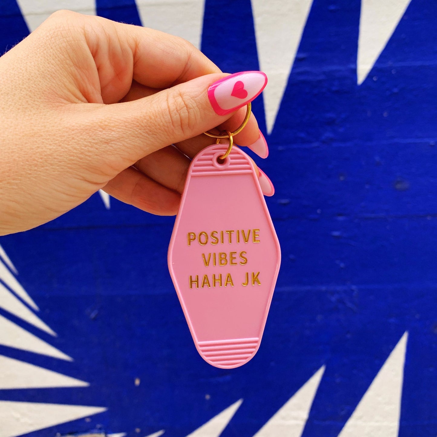 Positive Vibes Haha JK Motel Keychain in Pink by The Bullish Store