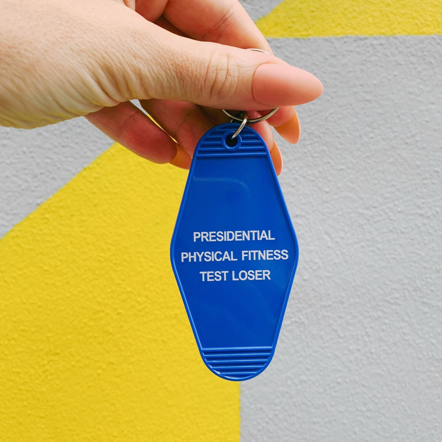 Presidential Physical Fitness Test Loser Motel Style Keychain in Blue by The Bullish Store