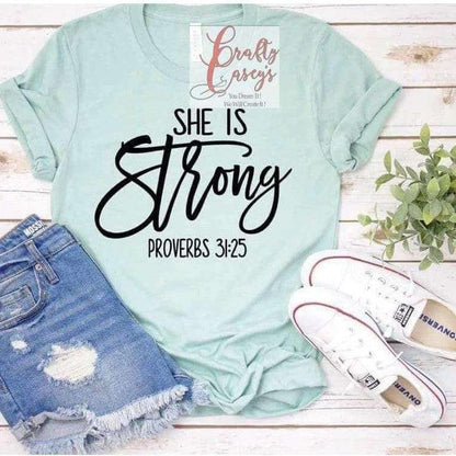 She Is Strong- Proverbs 31:25- Unisex T-shirts by Crafty Casey's