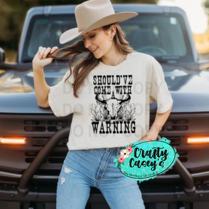 Should've Came With A Warning Steer-Tee by Crafty Casey's