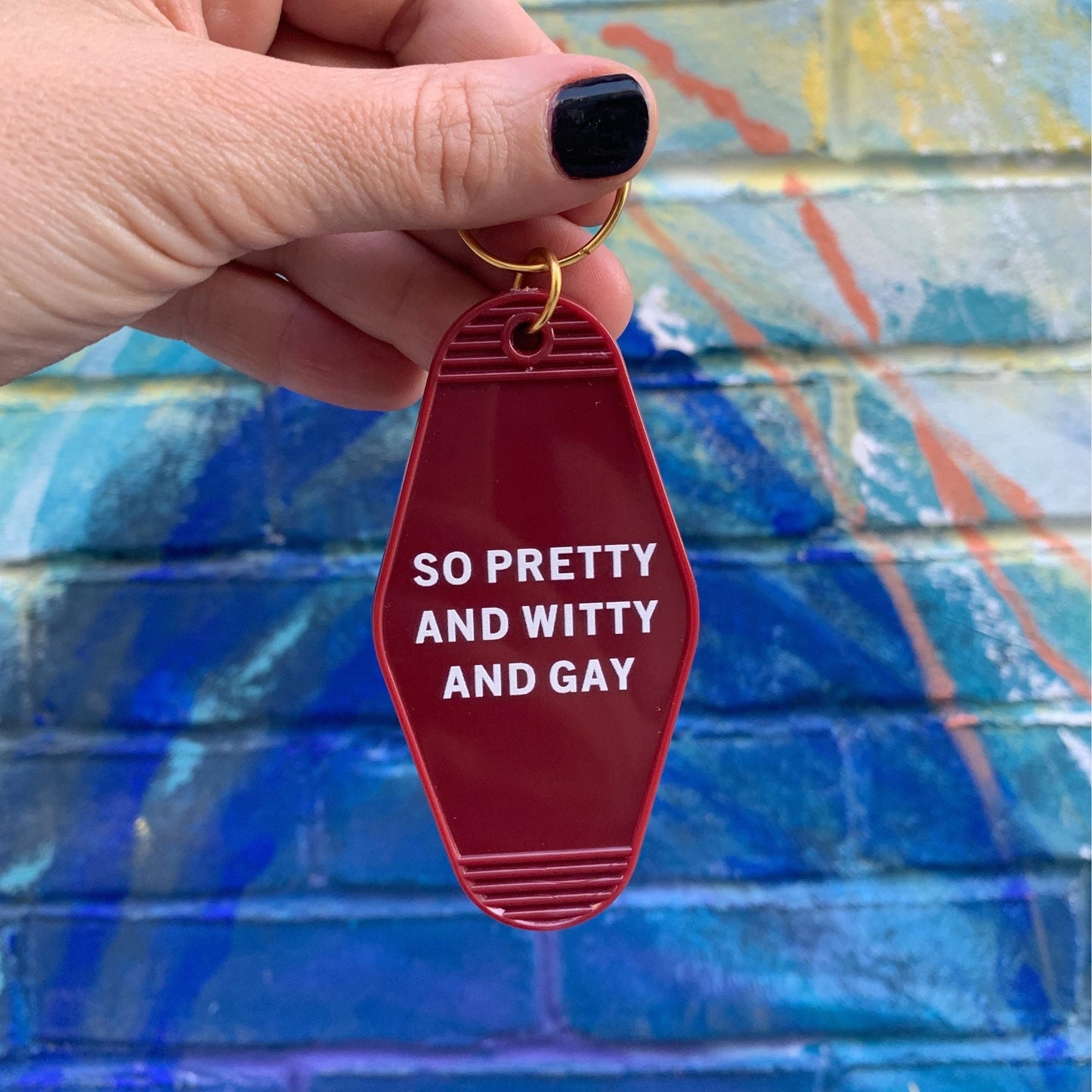 So Pretty and Witty and Gay Motel Style Keychain in Red by The Bullish Store