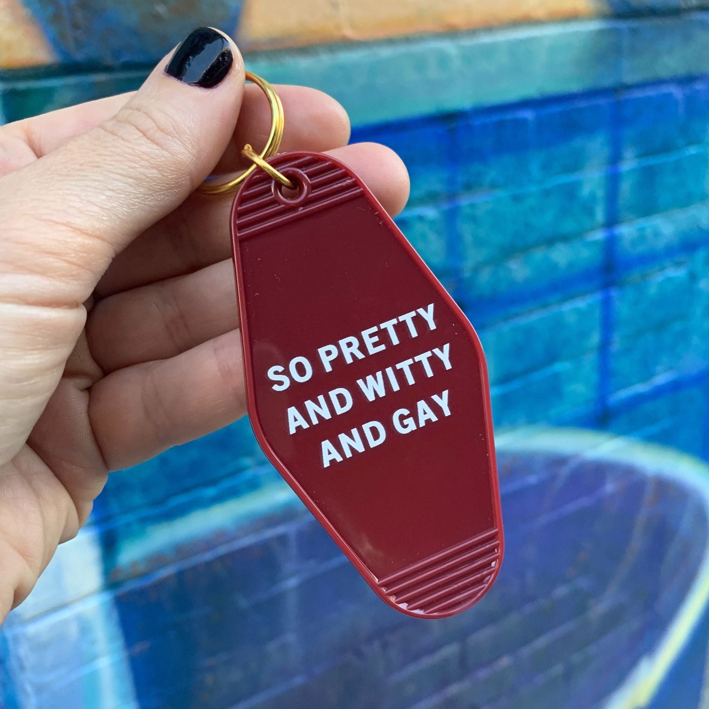 So Pretty and Witty and Gay Motel Style Keychain in Red by The Bullish Store