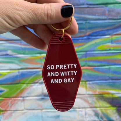 So Pretty and Witty and Gay Motel Style Keychain in Red by The Bullish Store