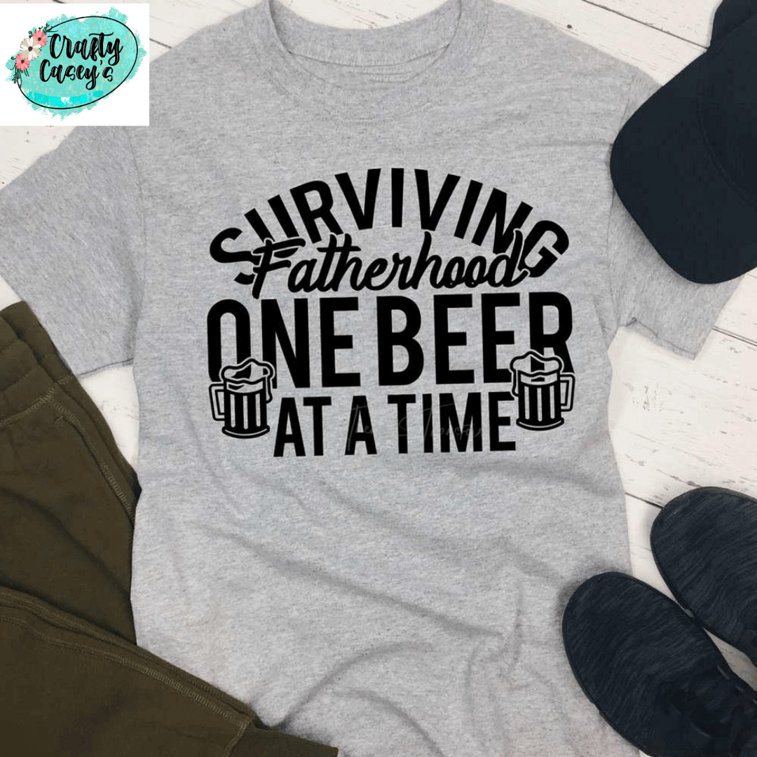 Surviving Fatherhood One Beer At A Time-Father's Day-Unisex T-shirts by Crafty Casey's