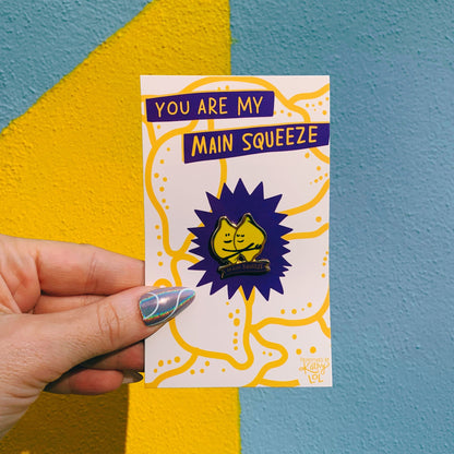 You Are My Main Squeeze Hugging Lemons Enamel Pin in Yellow by The Bullish Store