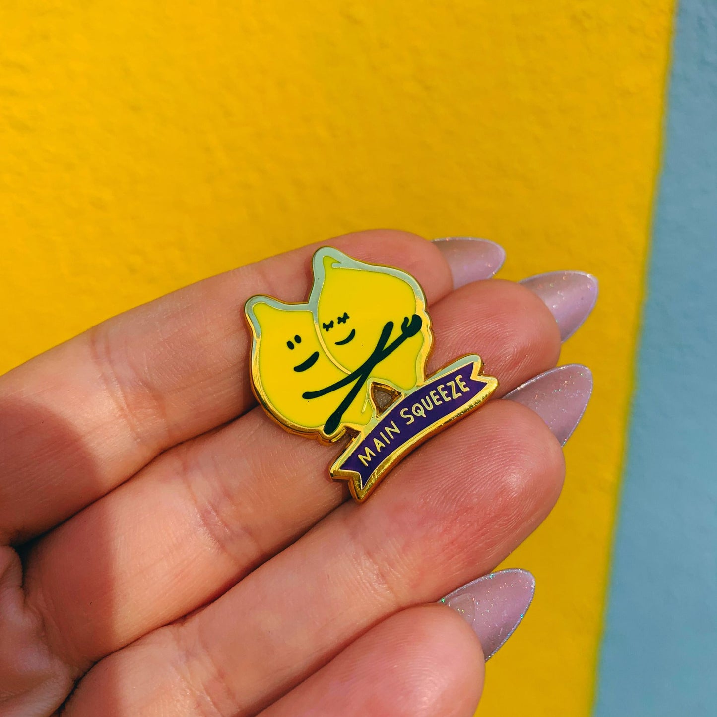 You Are My Main Squeeze Hugging Lemons Enamel Pin in Yellow by The Bullish Store