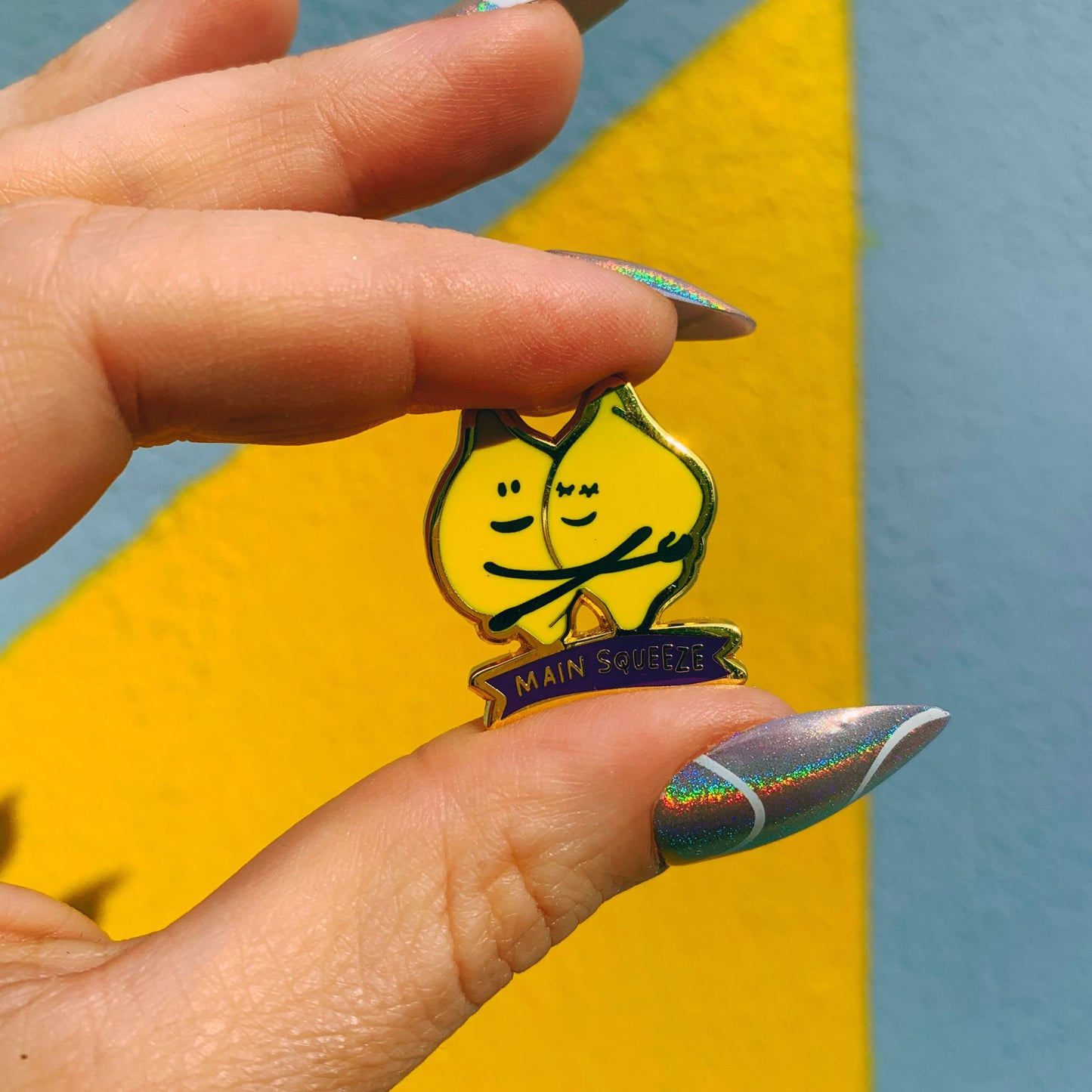 You Are My Main Squeeze Hugging Lemons Enamel Pin in Yellow by The Bullish Store