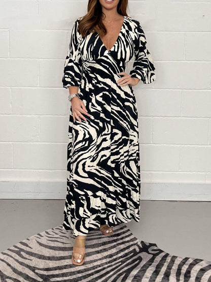 Smocked Printed Flounce Sleeve Maxi Dress by BlakWardrob