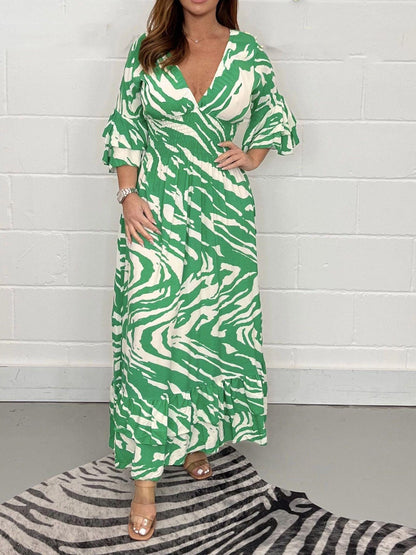 Smocked Printed Flounce Sleeve Maxi Dress by BlakWardrob