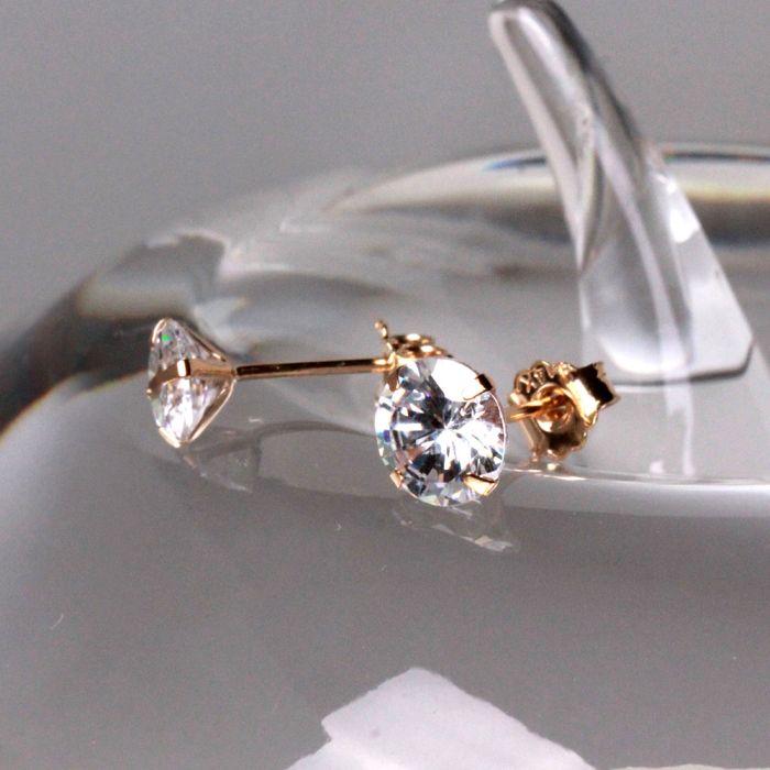 Pair of 14Kt Yellow Gold Clear Round CZ Stud Earrings by Fashion Hut Jewelry