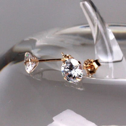 Pair of 14Kt Yellow Gold Clear Round CZ Stud Earrings by Fashion Hut Jewelry