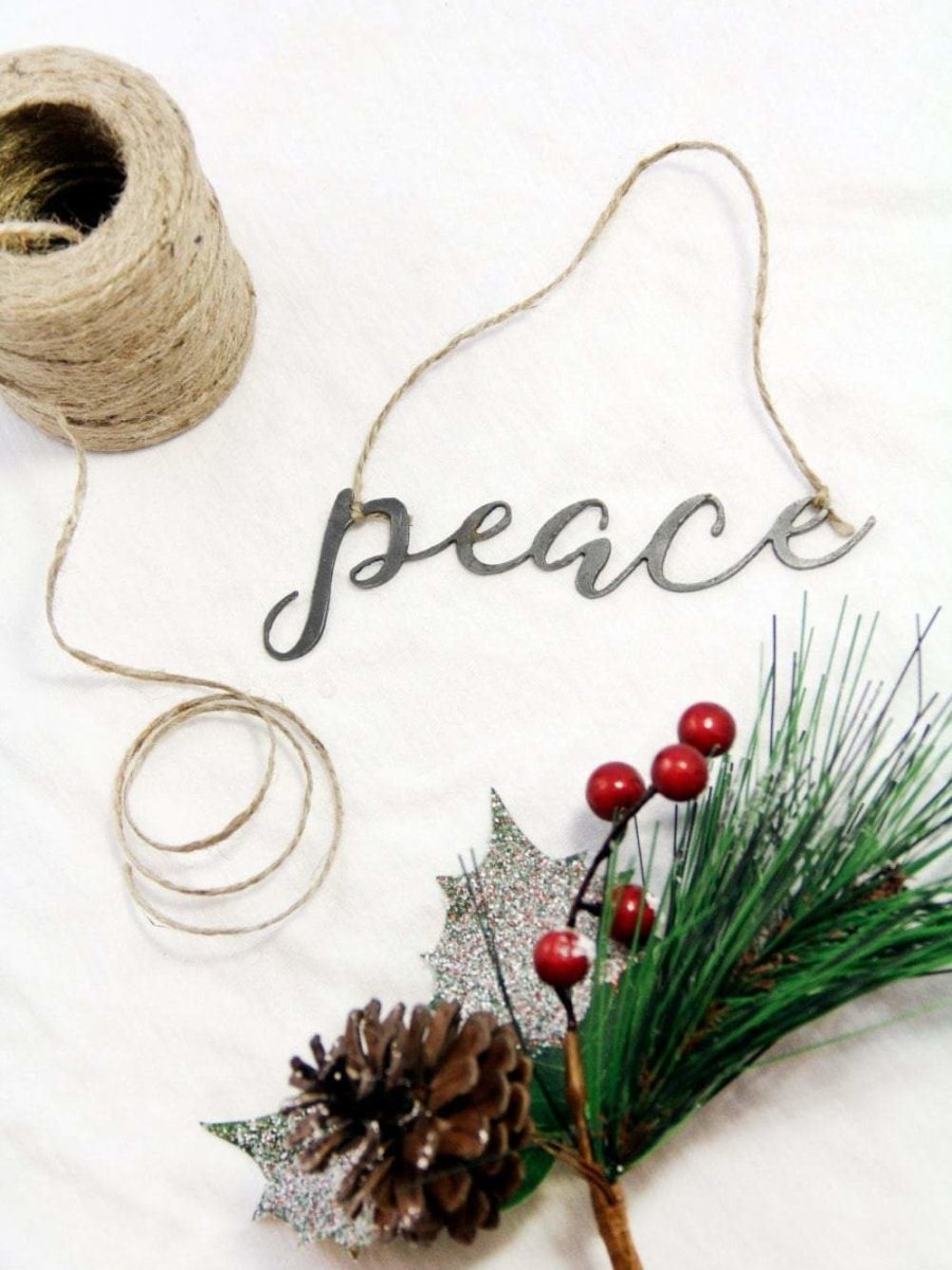 Peace Christmas Ornament by Jubilee Trading Company