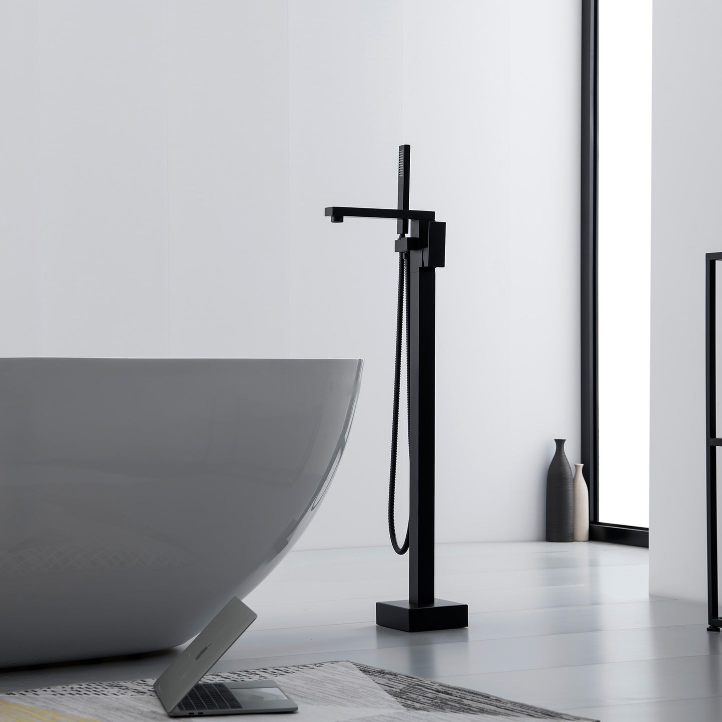 Single-Handle Freestanding Floor Mount Roman Tub Faucet Bathtub Filler with Hand Shower in Matte Black