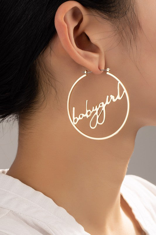 Babygirl verbiage inside a hoop earrings