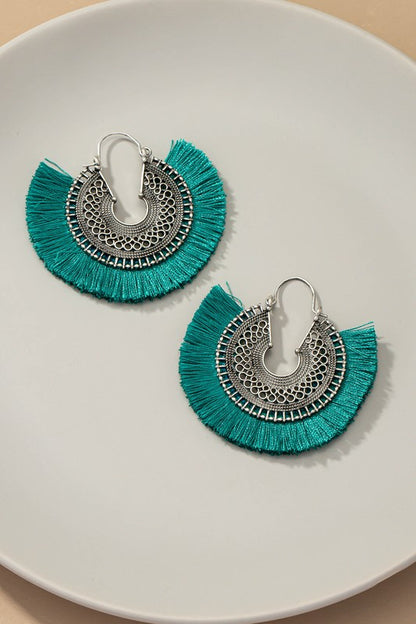 Openwork round disk earrings with tassels