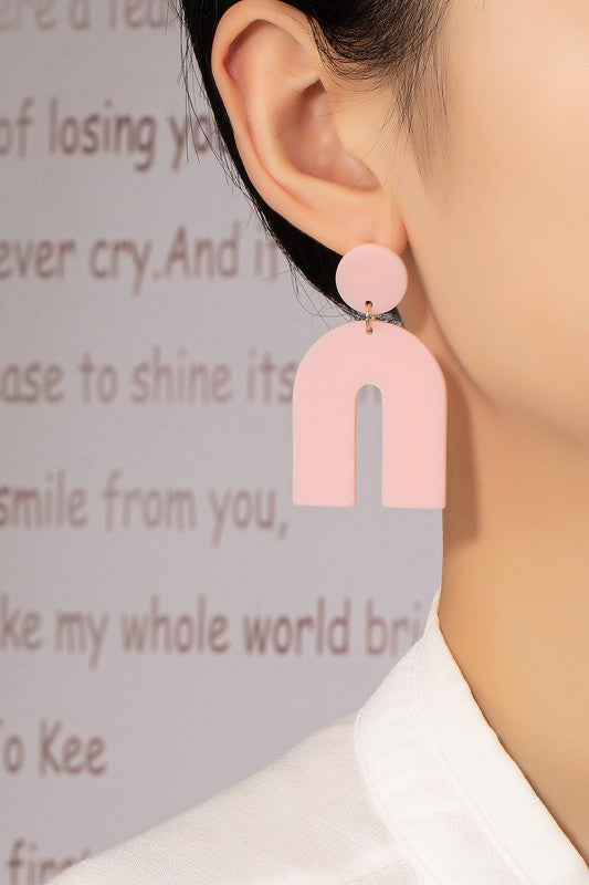 Matte color coated arch drop earrings