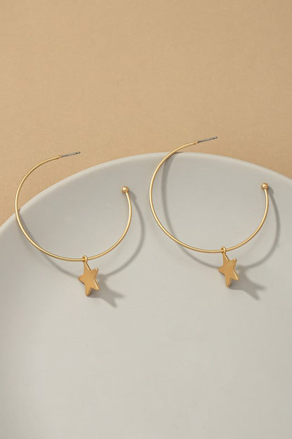 Dainty hoop earrings with star charms