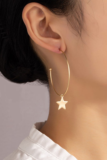 Dainty hoop earrings with star charms