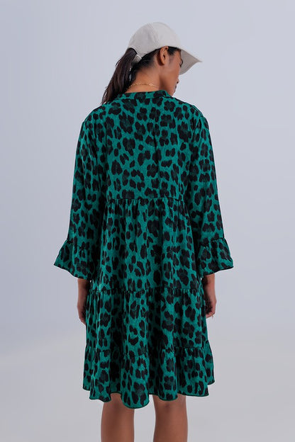 TIERED SMOCK MINI DRESS IN GREEN ANIMAL PRINT