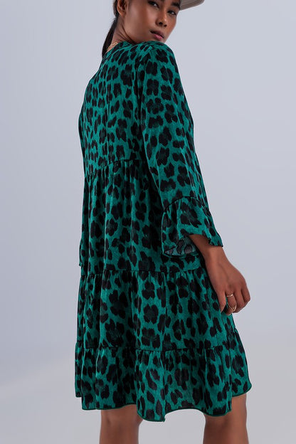 TIERED SMOCK MINI DRESS IN GREEN ANIMAL PRINT