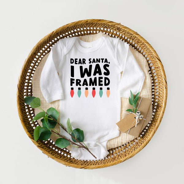 I Was Framed Lights Long Sleeve Onesie