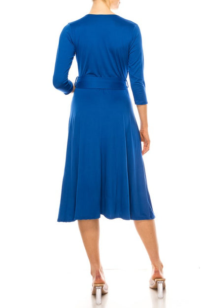 Solid faux wrap dress with deep V-neck