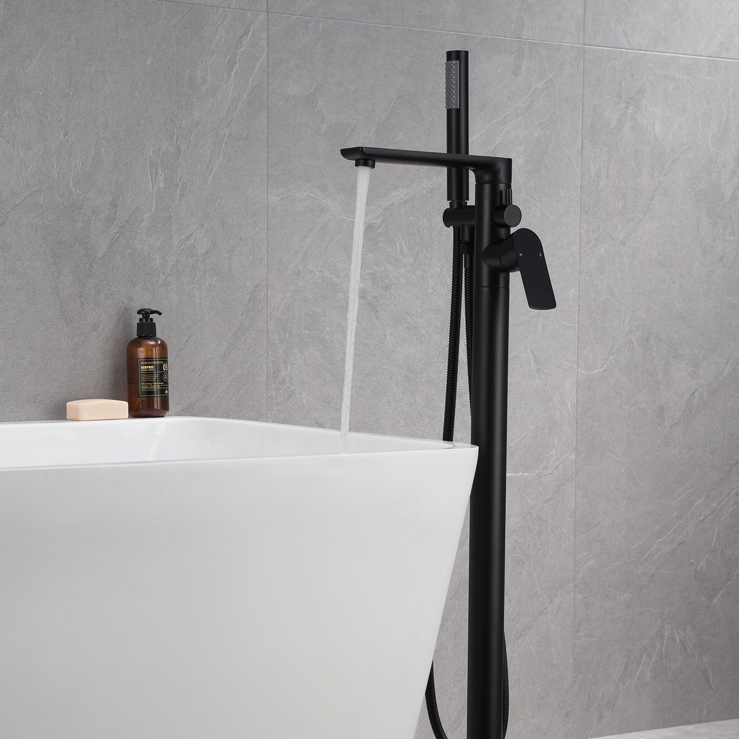 Single-Handle Freestanding Floor Mount Roman Tub Faucet Bathtub Filler with Hand Shower in Matte Black