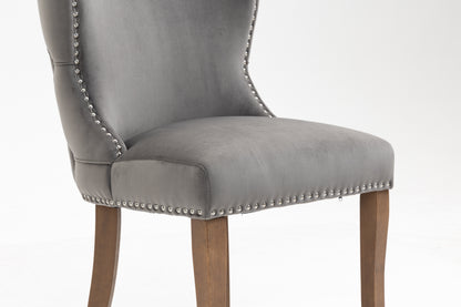 Set of 2 upholstered wing-back dining chair with backstitching nailhead trim and solid wood legs